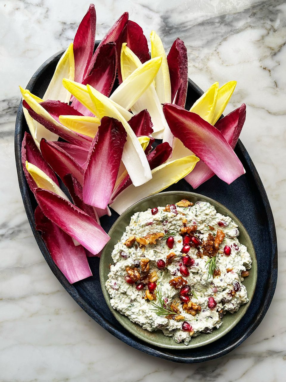 Chicory boats with feta, walnut and pomegranate