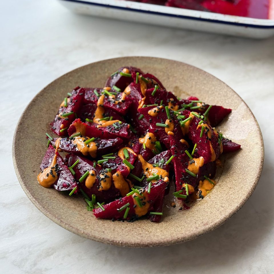 Gingery beetroot with peanut dressing, black sesame and chives