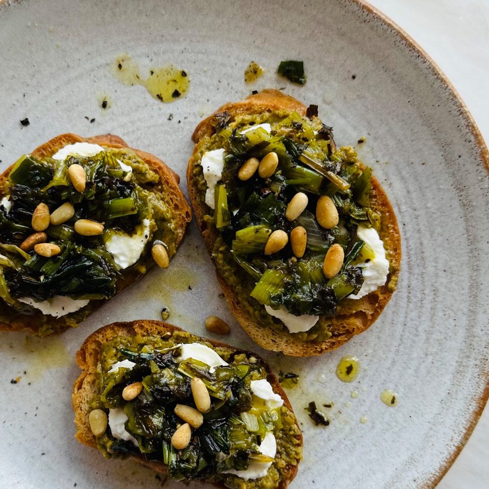 Miso pesto crostini with charred spring onion salsa