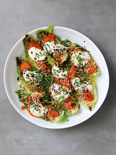 Charred hispi cabbage with tomato sauce and caraway mayo
