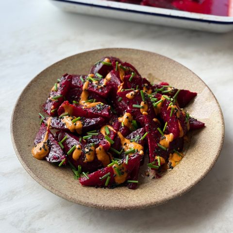 Gingery beetroot with peanut dressing, black sesame and chives