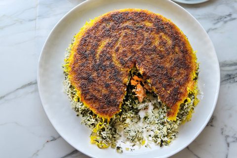 Herby tahdig with trout and preserved lemon yoghurt